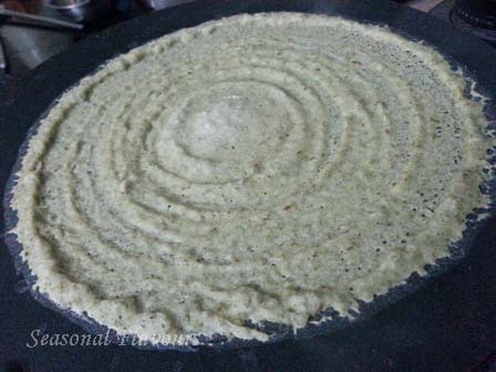 Spread moong dal batter on dosa tava for mung dal dosa recipe