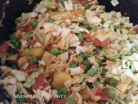 Add cabbage, fresh peas and potatoes to the curry for cabbage fry recipe