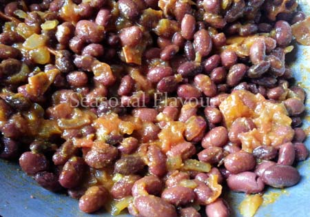 Add cooked rajma to masala gravy for rajma recipe