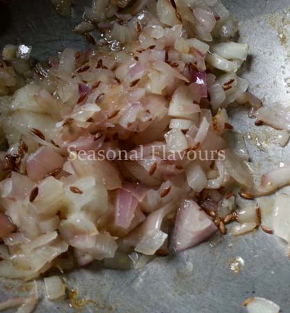 Saute onions for Indian kidney beans curry recipe
