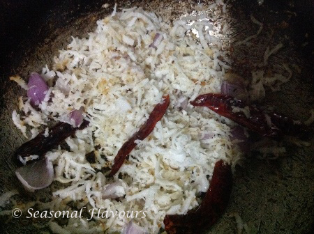 Roast shallots, red chillies, coconut for Kadachakka curry