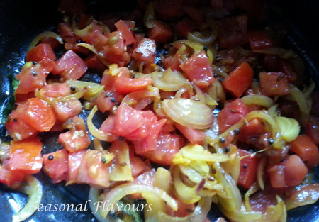 Add tomatoes for Garlic Tomato Dal