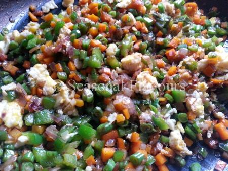 Add egg, seasoning and sauces for Chinese stir fry rice