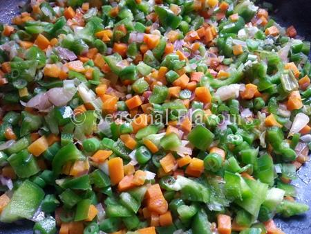 Add the chopped veggies for eggs with rice recipe