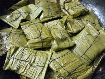 Fish cooked in banana leaves Bengali style