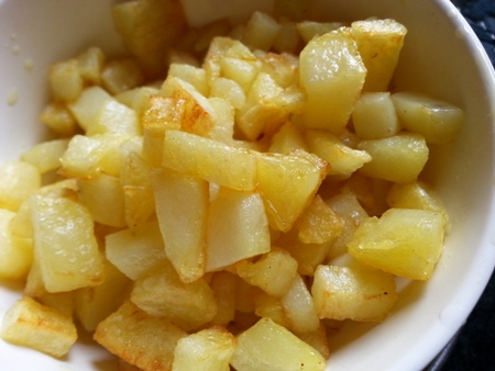 Fry potatoes for flattened rice upma