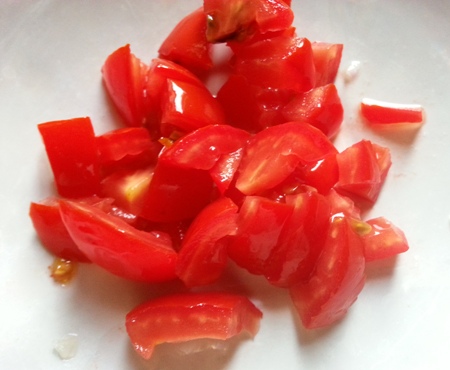 Chopped tomatoes for Palak Aloo