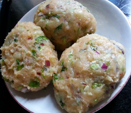 Wrap eggs in potato mixture for Bengali egg chop