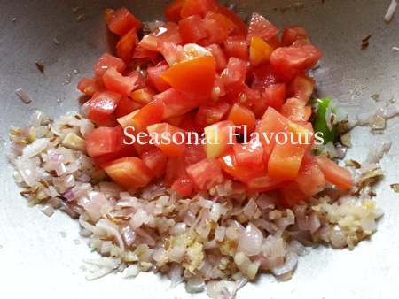 Add chopped tomatoes for whole black lentils dhal