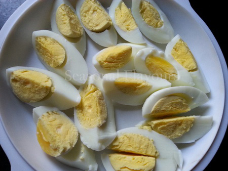 Boil and quarter eggs for Honey Fried Eggs