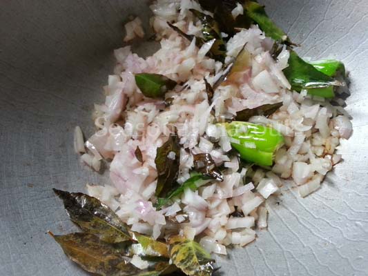Saute curry leaves and onions for Andhra fish recipe