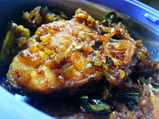 Garnish Fish Fry with coriander leaves