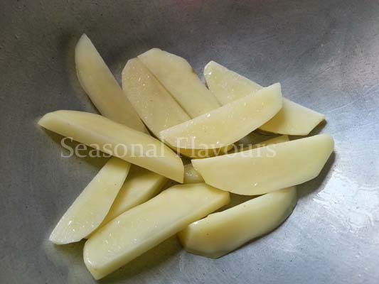 Saute potato wedges for drumsticks Bengali recipe