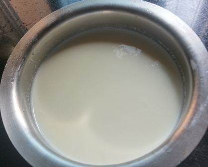 Boil milk for Komla Lebur Payesh recipe