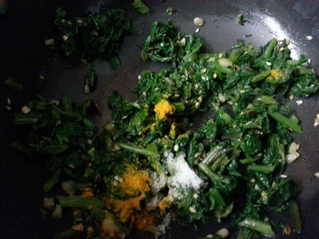 add seasoning to spinach