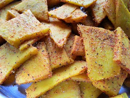  Mix yam slices with besan and spices