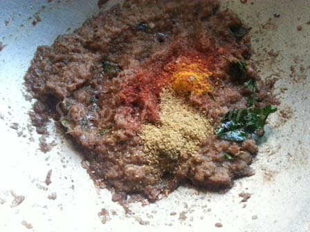 Add spices for masala eggplant fry recipe