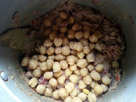 Add cooked chole for Indian pulao recipe
