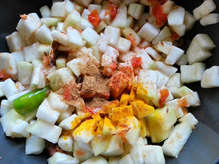 Add spices for Lauki aur Wadiyon ki Sabzi