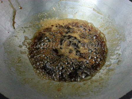 Boil jaggery syrup for Til Gul Recipe