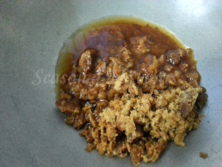 Add grated jaggery for Til Kut Recipe