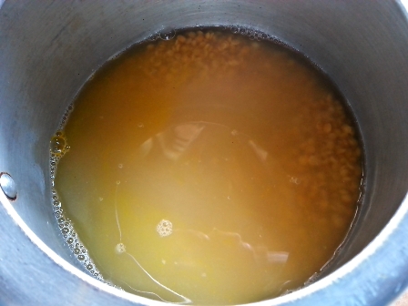 Boil split pigeon peas to make sambar Andhra style