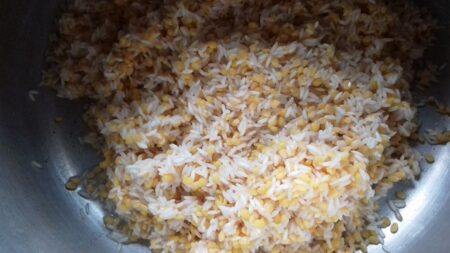 Pressure cook rice and moong dal for tiffin recipe