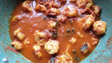 Add water to the Andhra Prawn Masala Curry