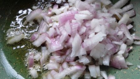 Saute onions for beans korma