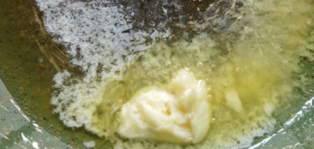 Melt butter for garlic mushrooms