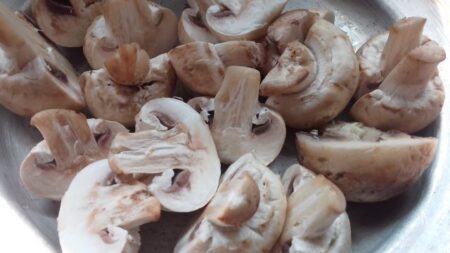 Add the sliced mushrooms