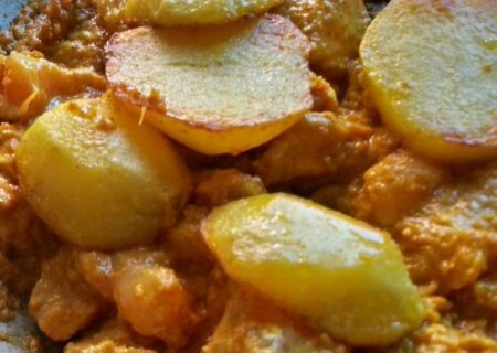 Add potatoes to chicken curry