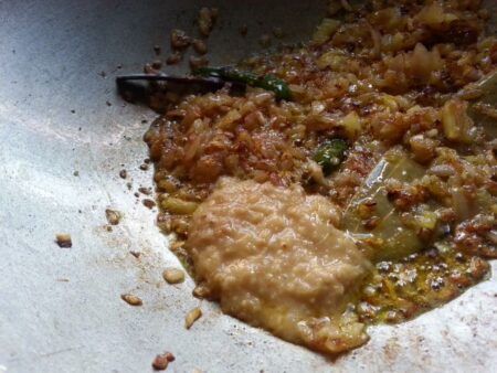 Add ginger garlic paste to fried onions