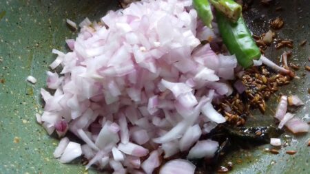 Fry onions for fish gravy