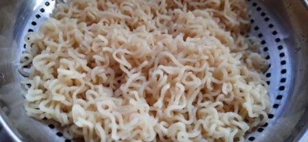 Strain boiled noodles for bhel