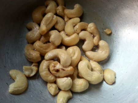 Roast cashews for Chocolate Biscuit Custard Pudding
