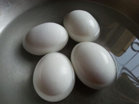 Boil eggs for dimer curry