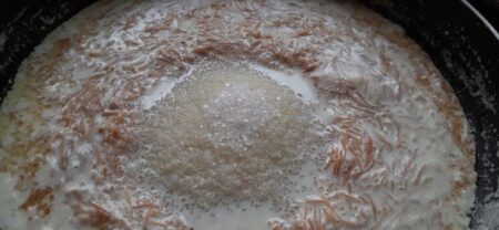 Stir in sugar for Semiya Payasam Traditional