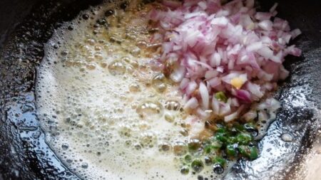 Add onions to pan