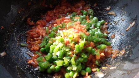Add veggies to pan