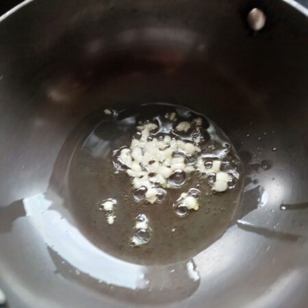 Saute garlic in oil
