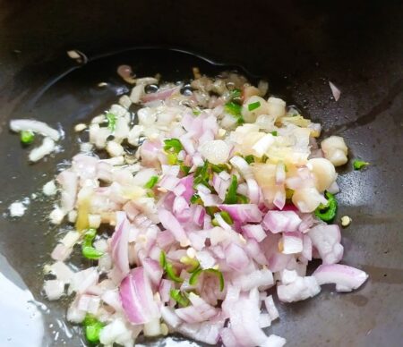 Add onions, chillies, spring onions