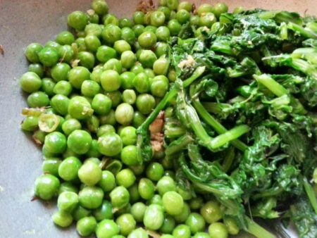 Add green peas, spinach, mint and coriander leaves