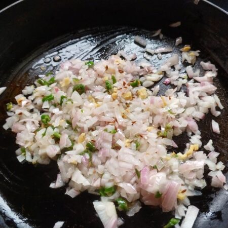 Saute onions for Mumbai anda bhurji