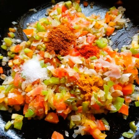 Sprinkle spices for masala anda scrambled recipe