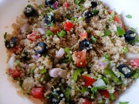Add salad dressing to quinoa