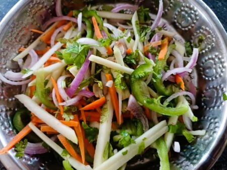 Mix the salad veggies