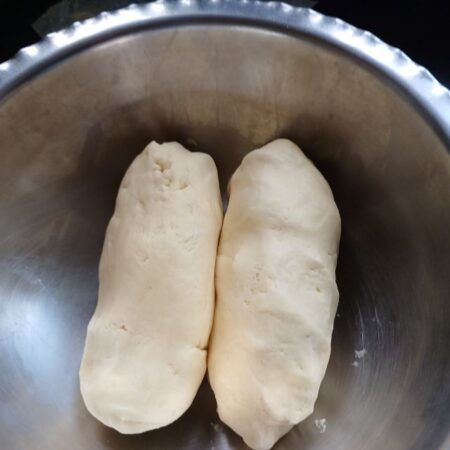 Divide dough in half