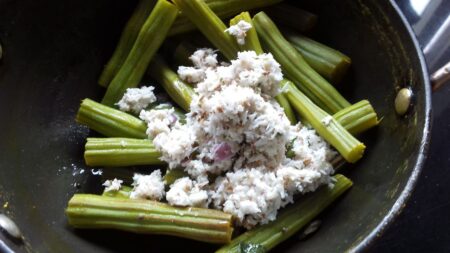 Add ground coconut mixture for Poriyal recipe with drumsticks