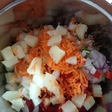 Cilantro added to salad bowl